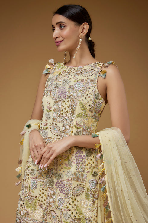 Pale Yellow Embroidered Back Tie-Up Kurta With One Frill Sharara And Dupatta